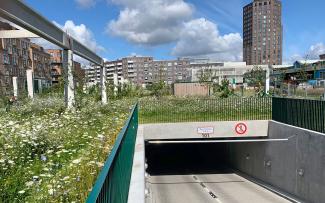 Luckily, all parked cars are hidden below the magnificent greenery. © Malmos A/S / ZinCo Entrance into an underground car park